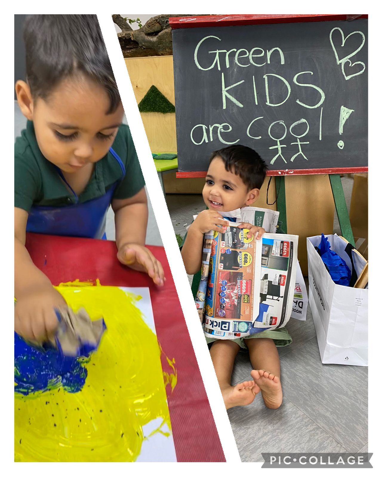 A child is sitting in front of a sign that says green kids are cool