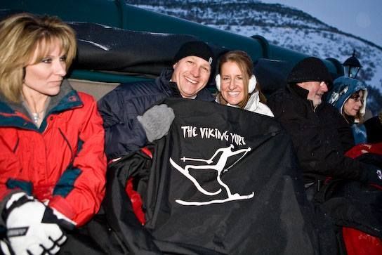 Couple dressed warm under a viking yurt blanket