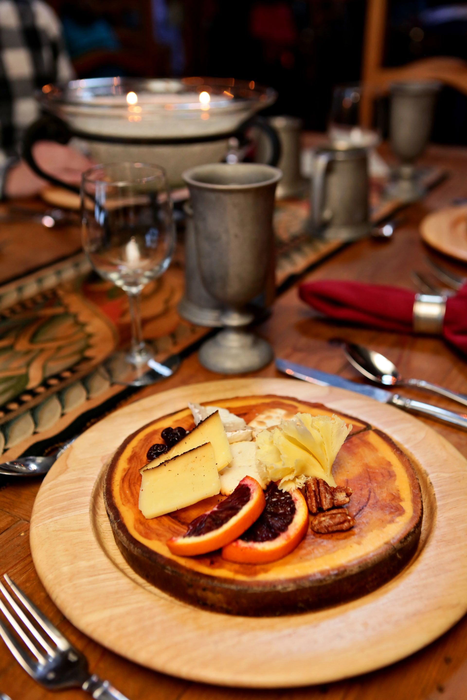 fruit, nuts, and cheese on a platter