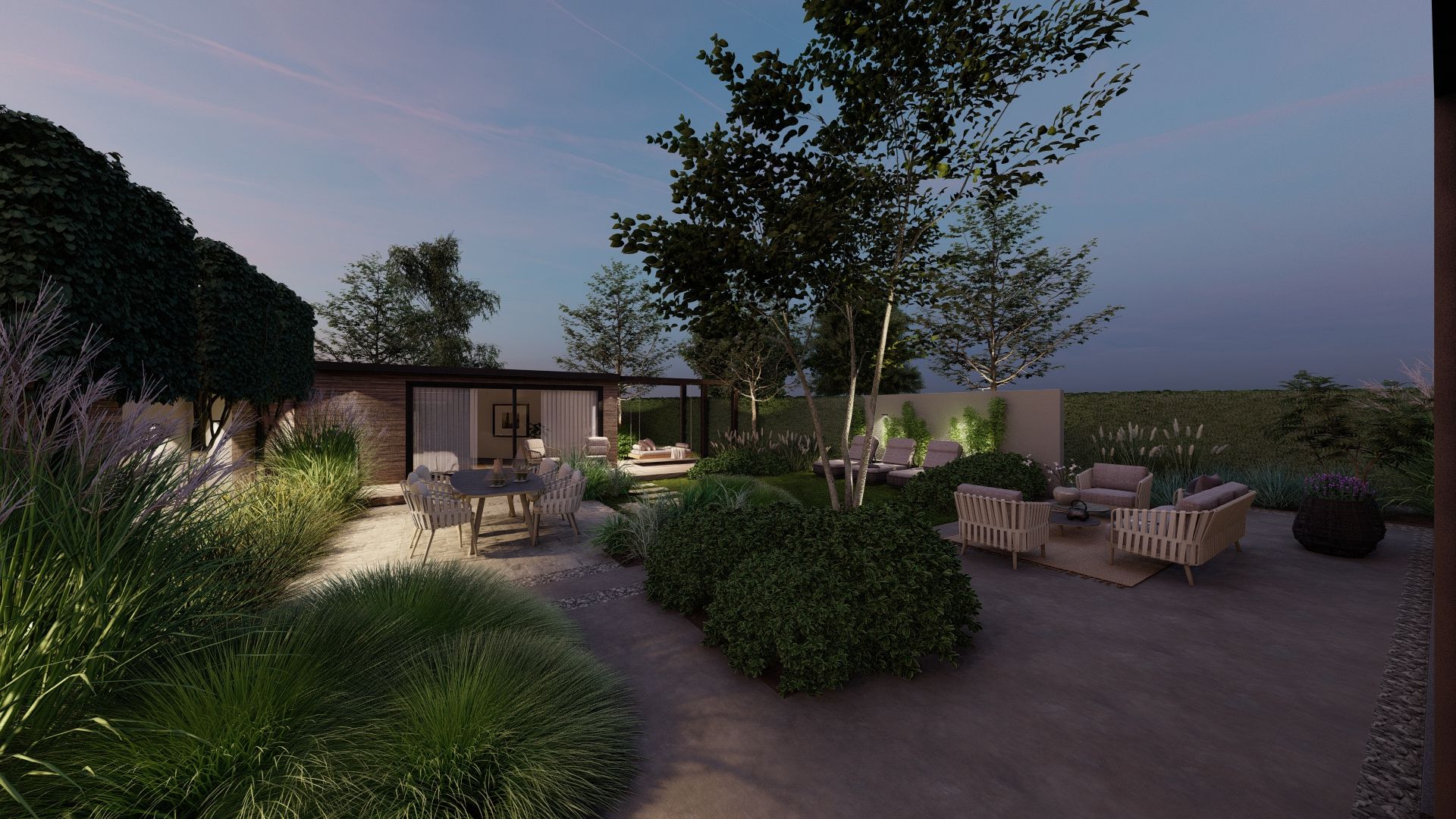 Buitenterras met sfeervolle, bij schemering verlichte beplanting; zitgedeelte met tafel en stoelen.