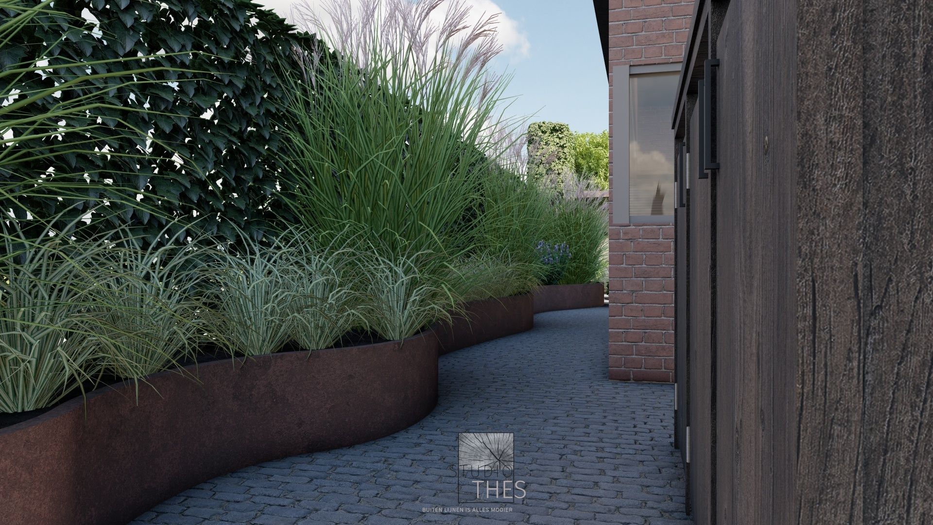 Metalen plantenbakken met siergrassen staan langs een wandelpad naast een gebouw.