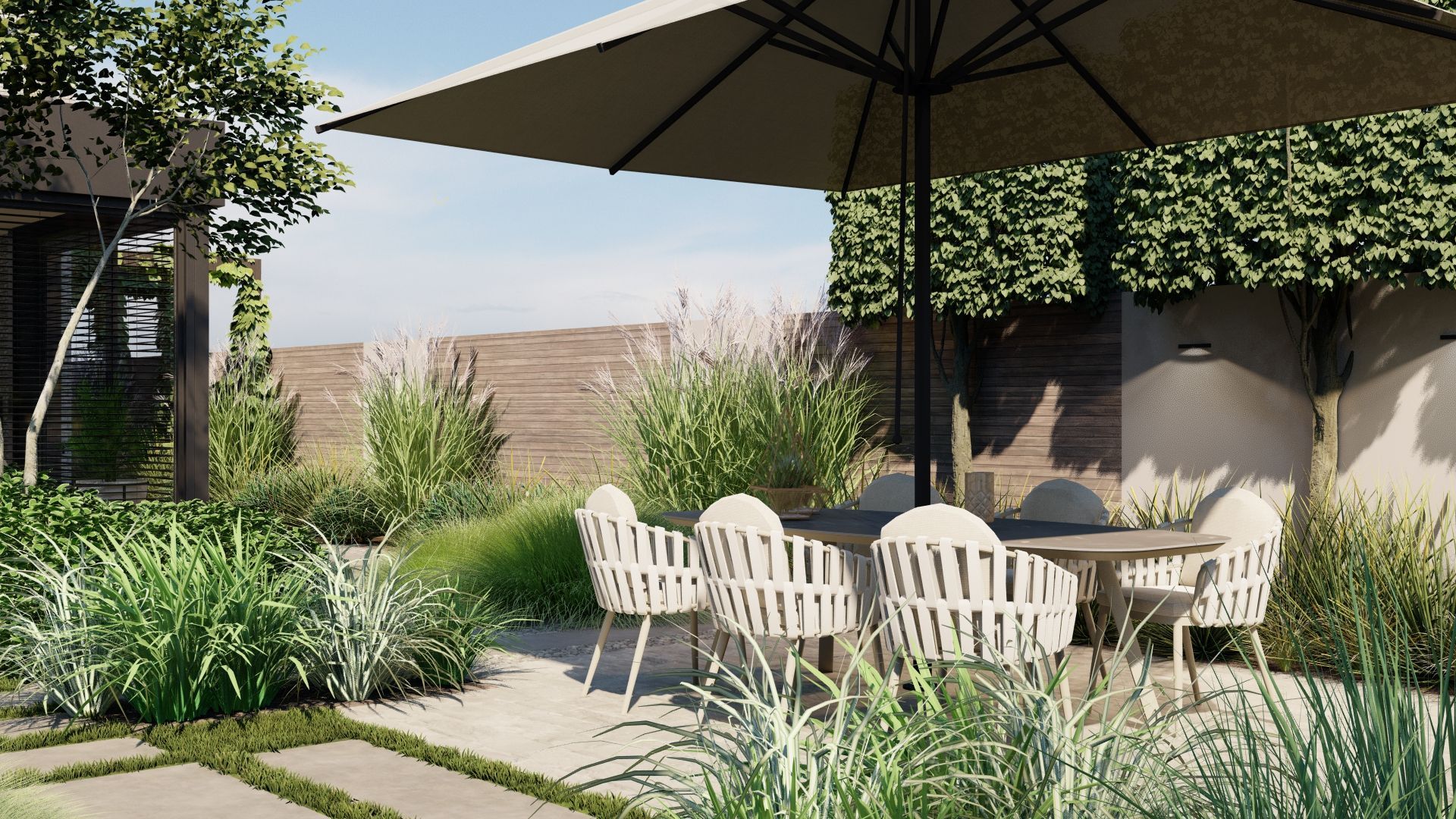 Eetgedeelte buiten met een tafel, stoelen en parasol, omgeven door planten en een stenen terras.