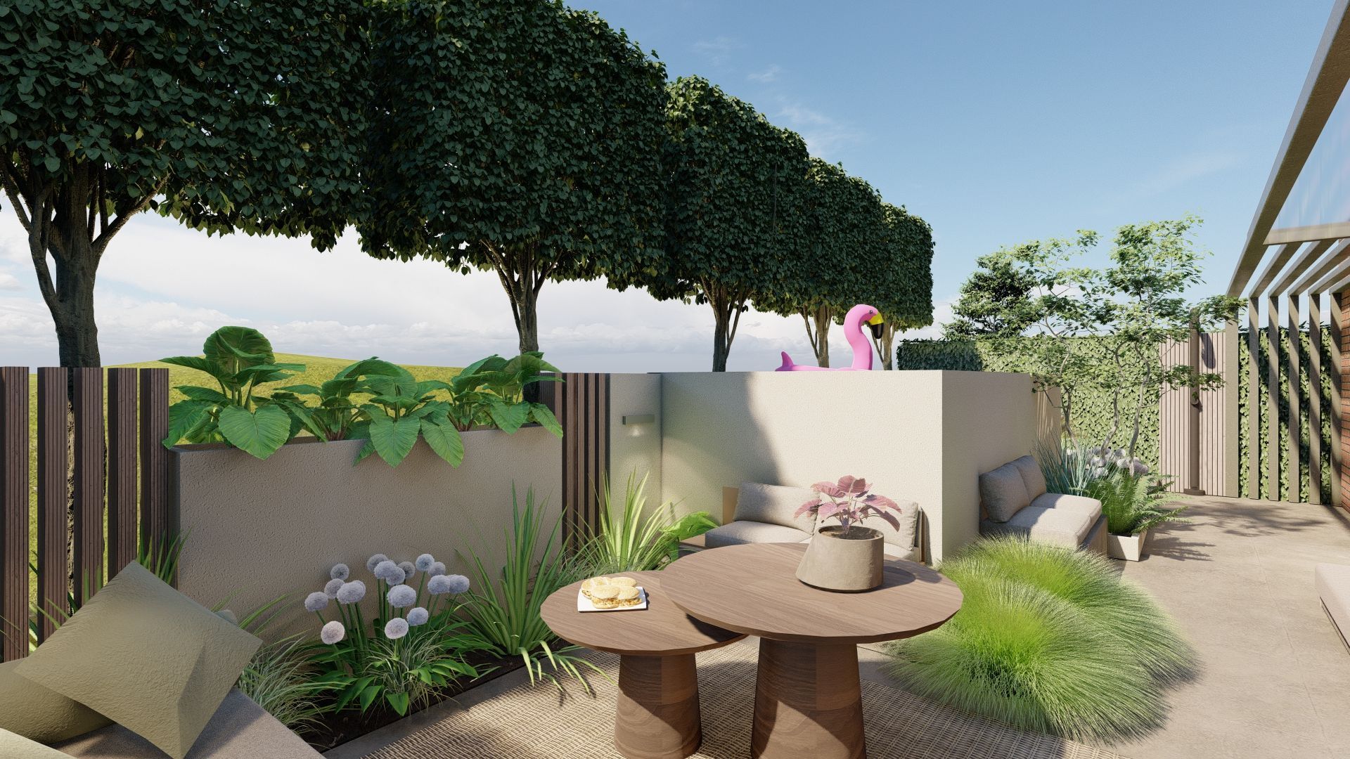 Terras met zitjes, planten en een tafeltje. Weelderige groene bomen en een blauwe lucht op de achtergrond.