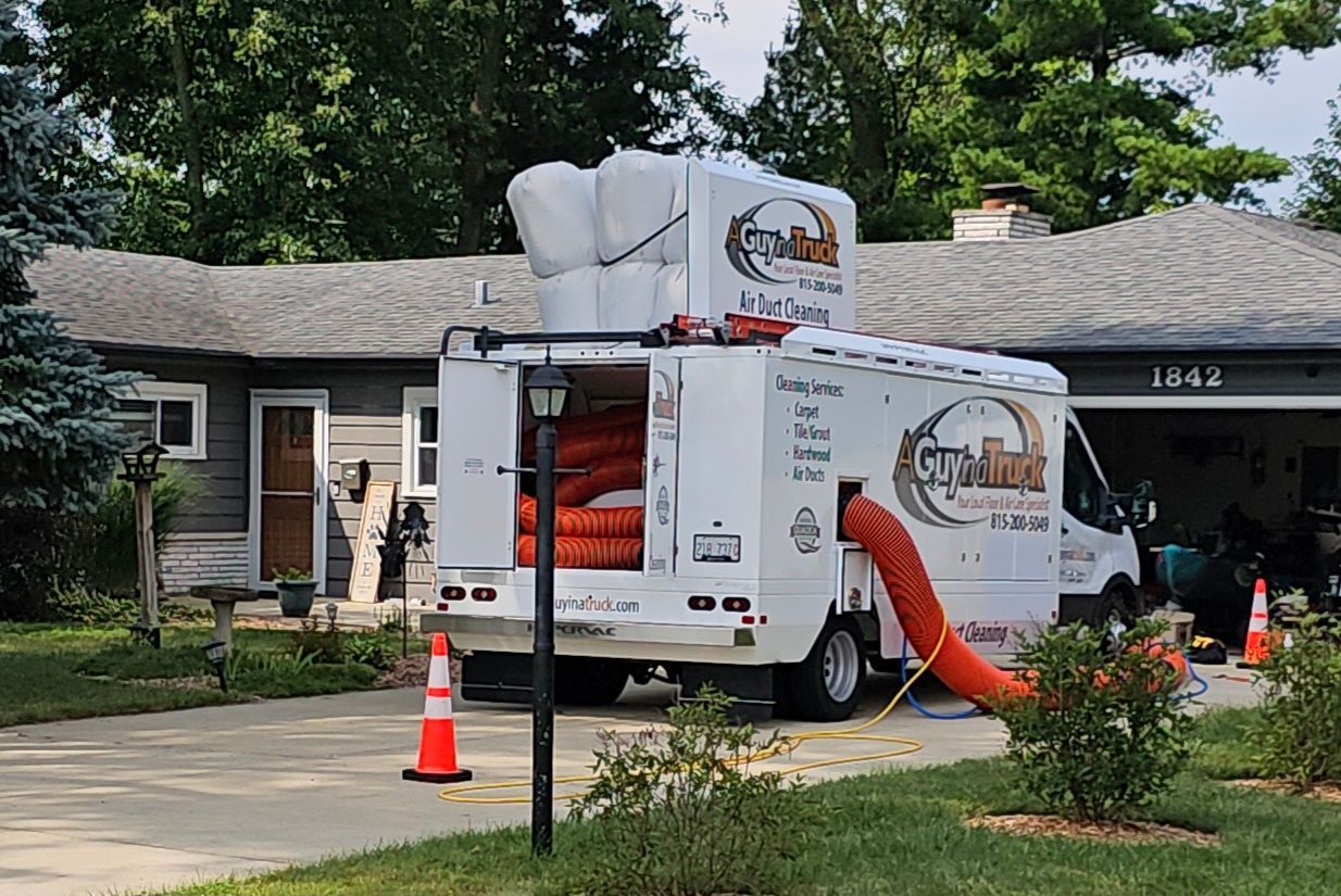 A Guy in a Truck duct cleaning truck providing residential air duct cleaning in Fox Valley.