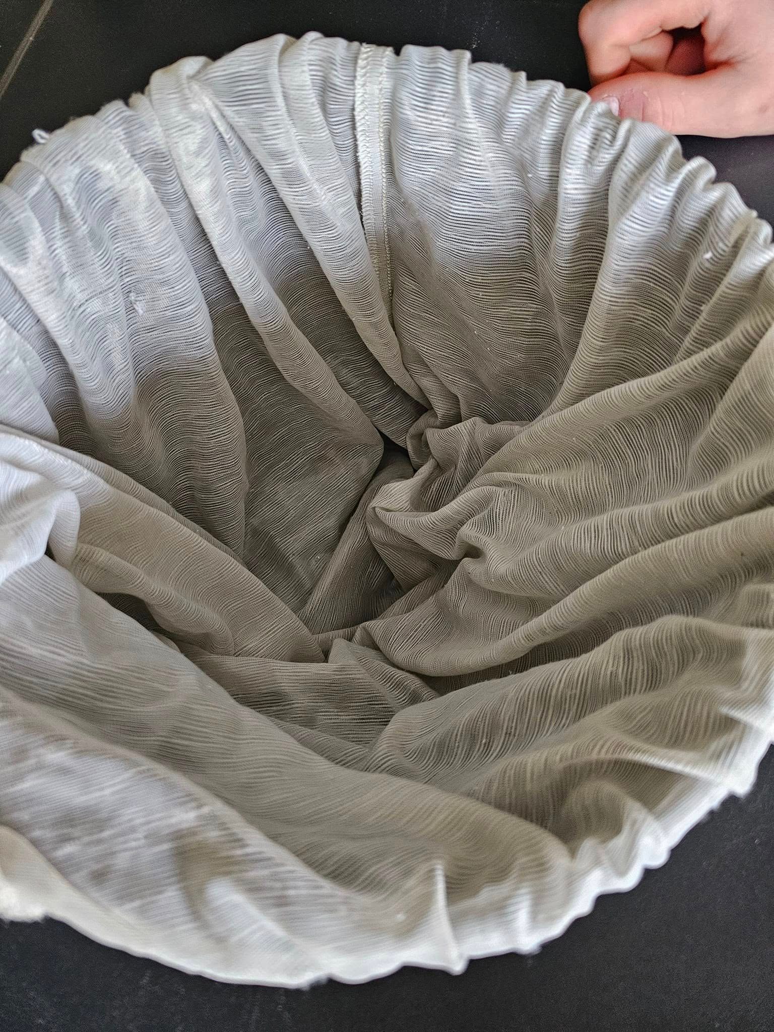 Clean fabric filter bag inside an air duct cleaning machine before use.