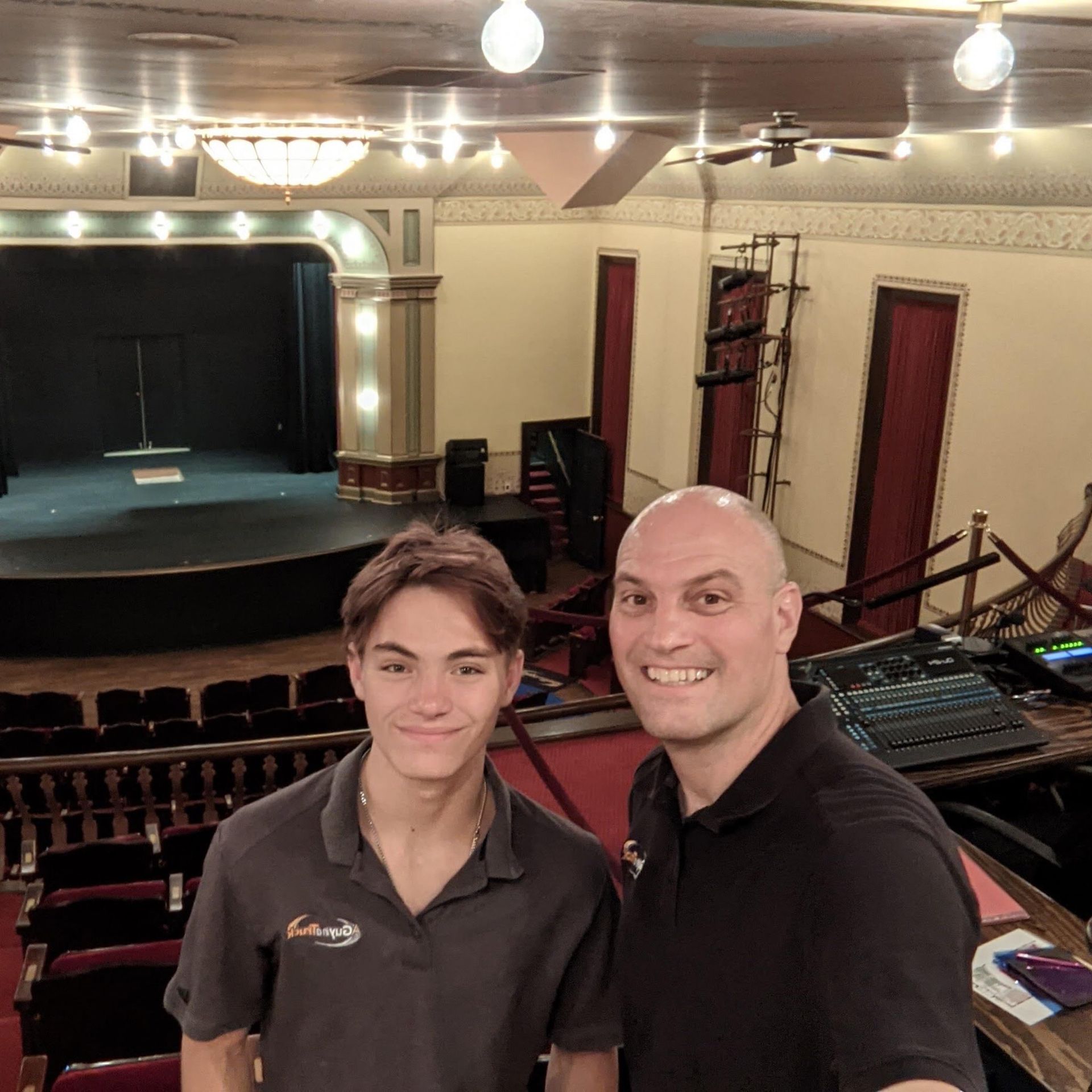A Guy in a Truck team at historic theater balcony after commercial floor cleaning service