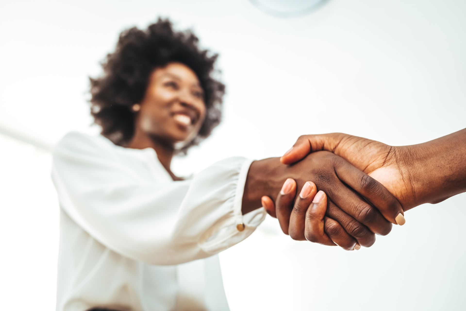 two people shaking hands