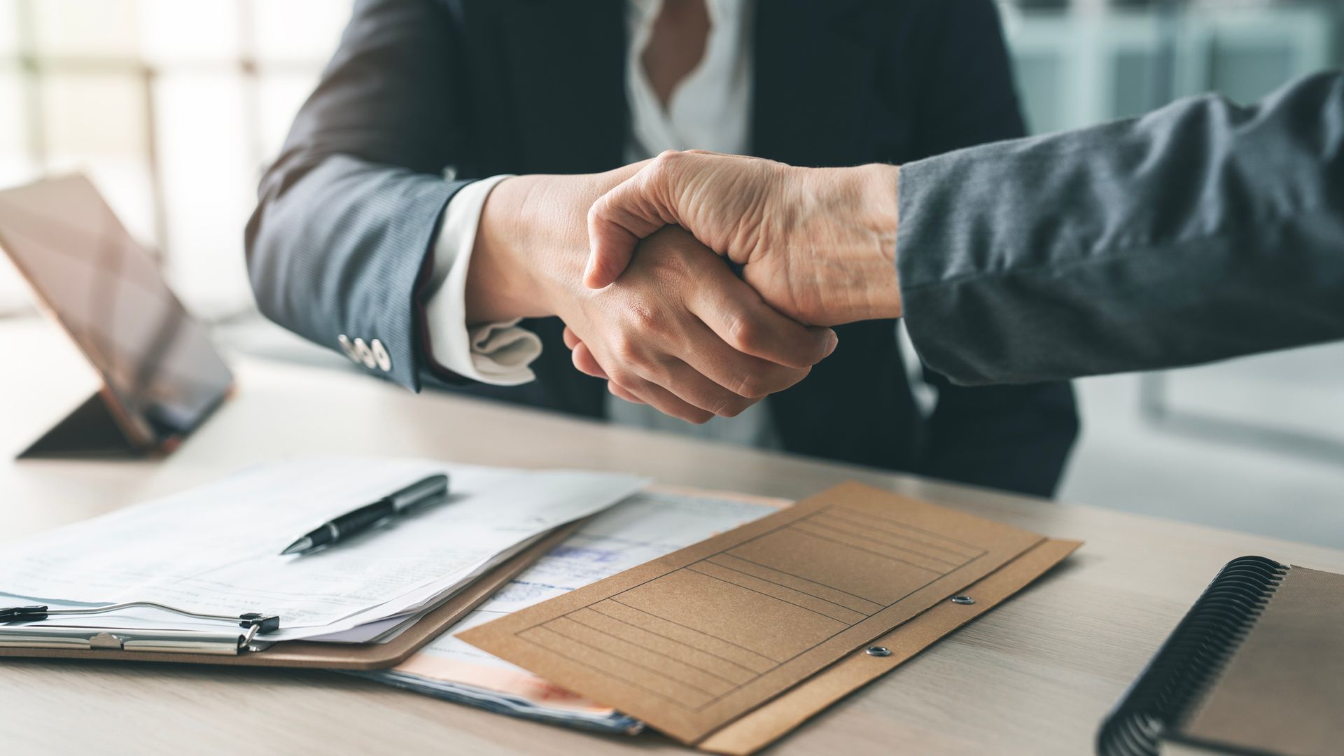 two people shaking hands
