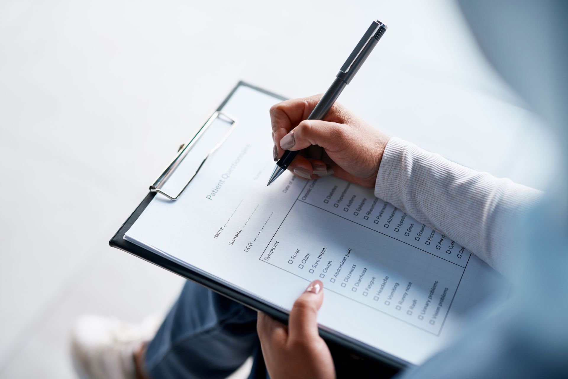 Patient filling out form Patient filling out form