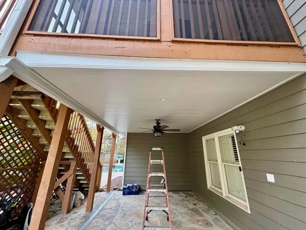 After installing white aluminum deck ceiling with built in ceiling fan and LED lighting features.