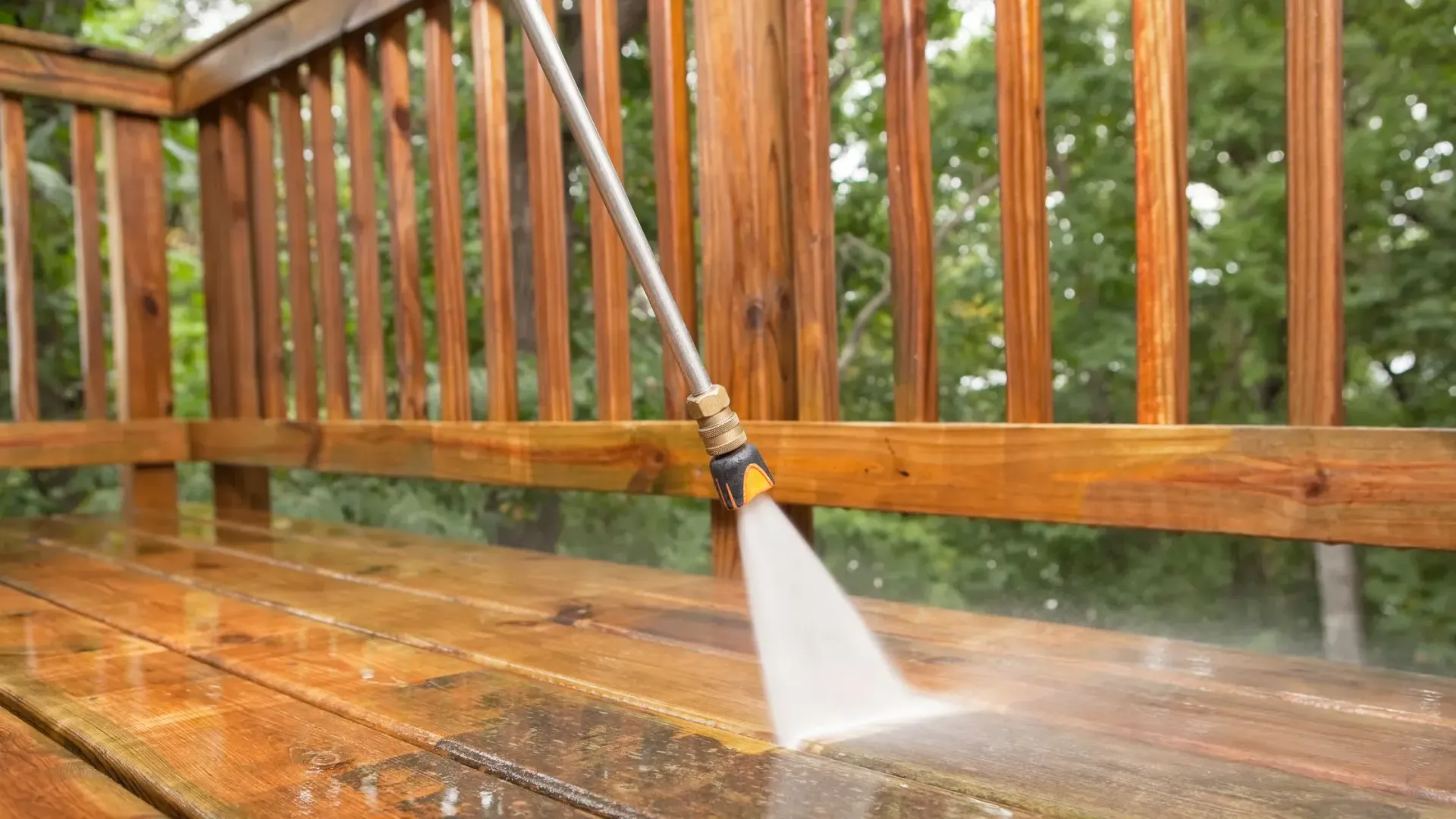 Aluminum under the deck ceiling that includes two ceiling fans, outdoor lighting, and drainage.