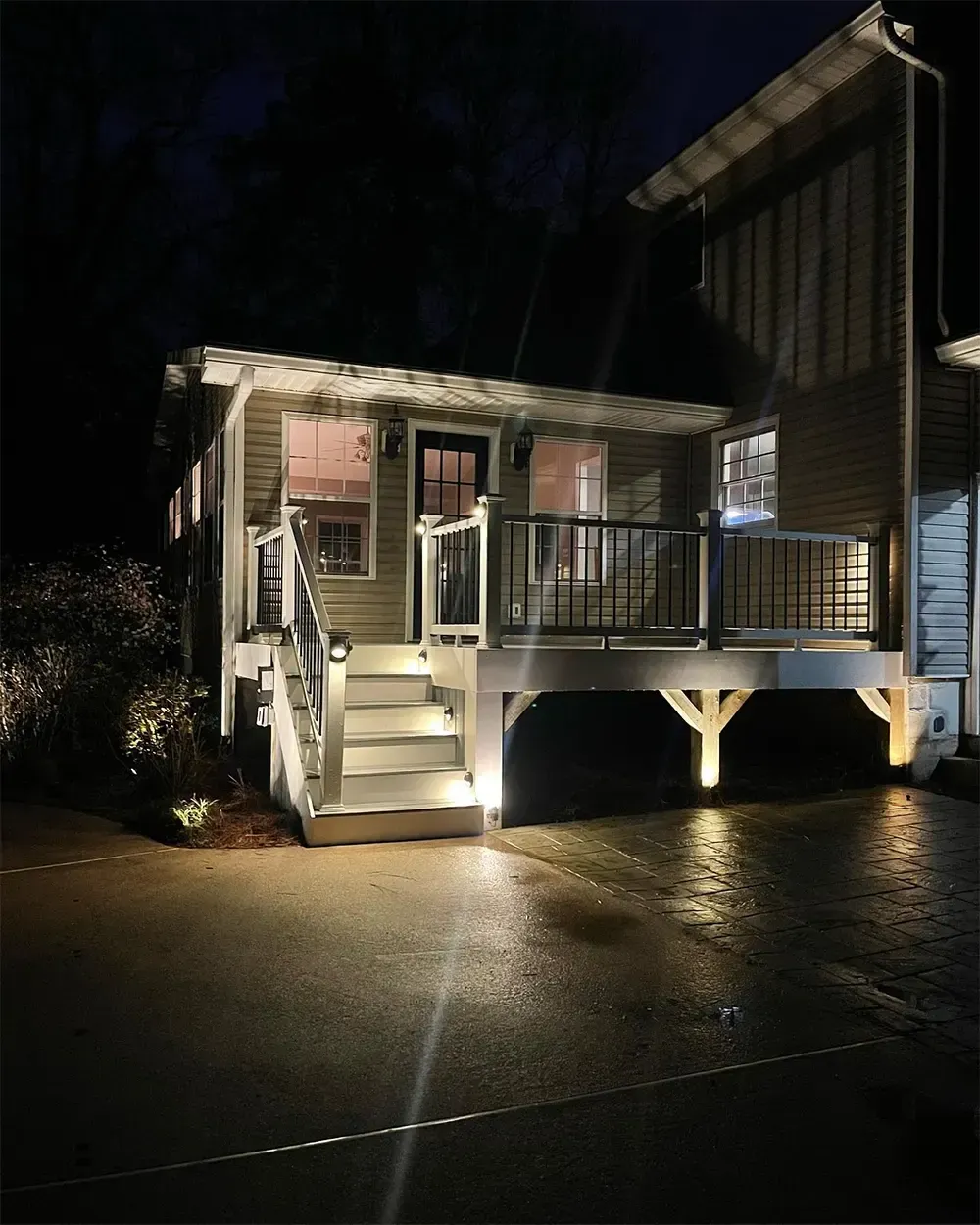Custom deck stairs built by Maxi Decks Protection with added LED lighting features.