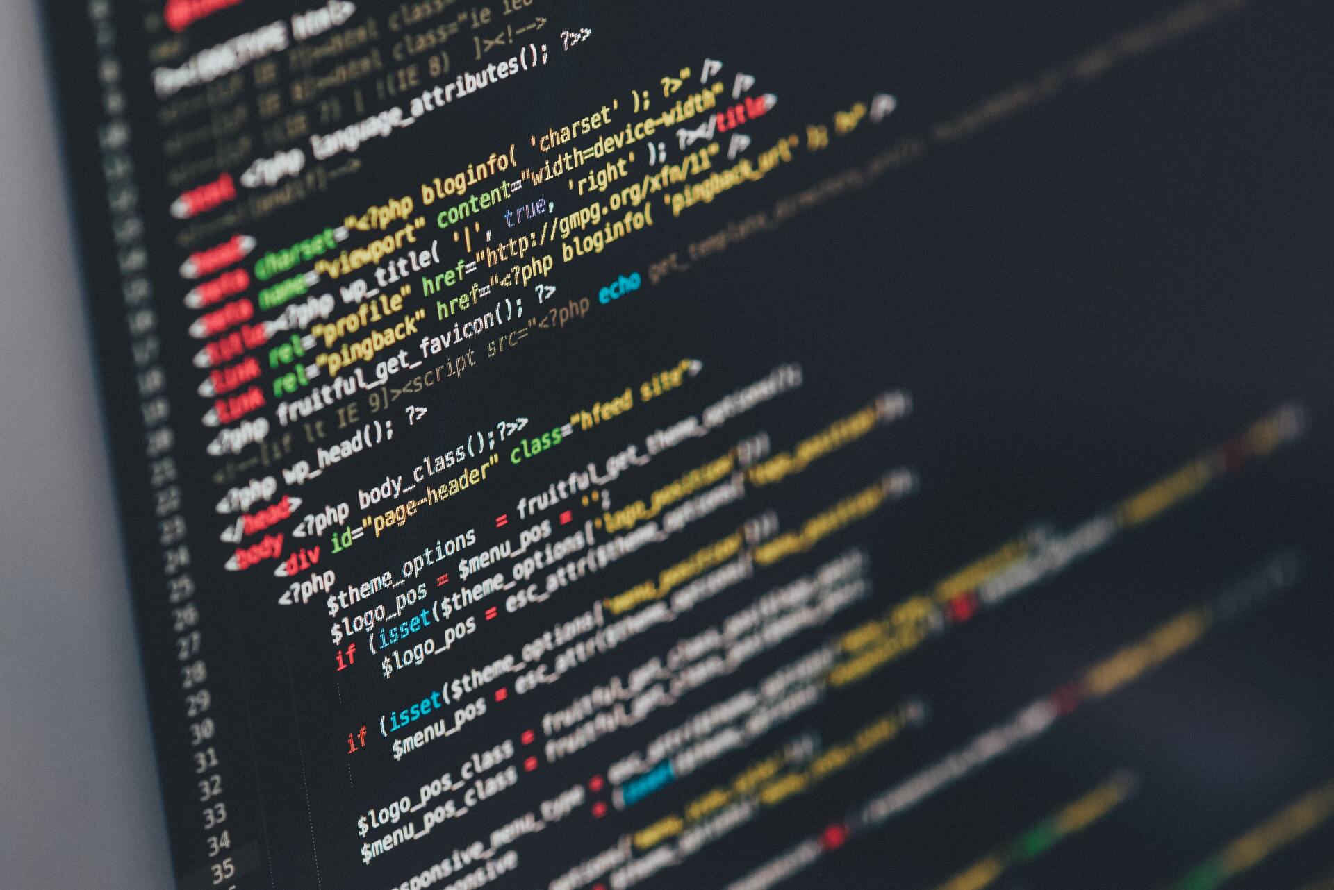 A close up of a computer screen with a lot of code on it.