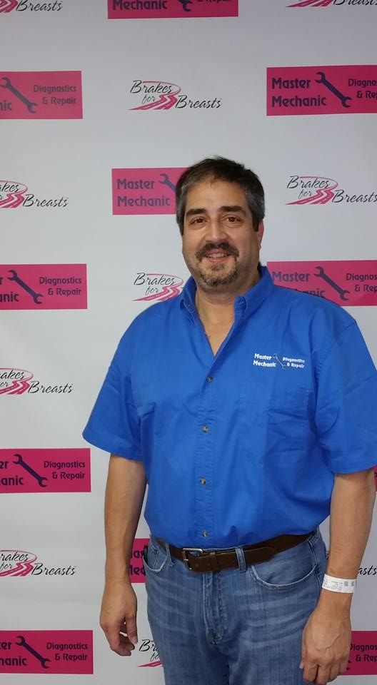 Don in front of Master Mechanic and Brakes For Breasts background | Brakes For Breasts