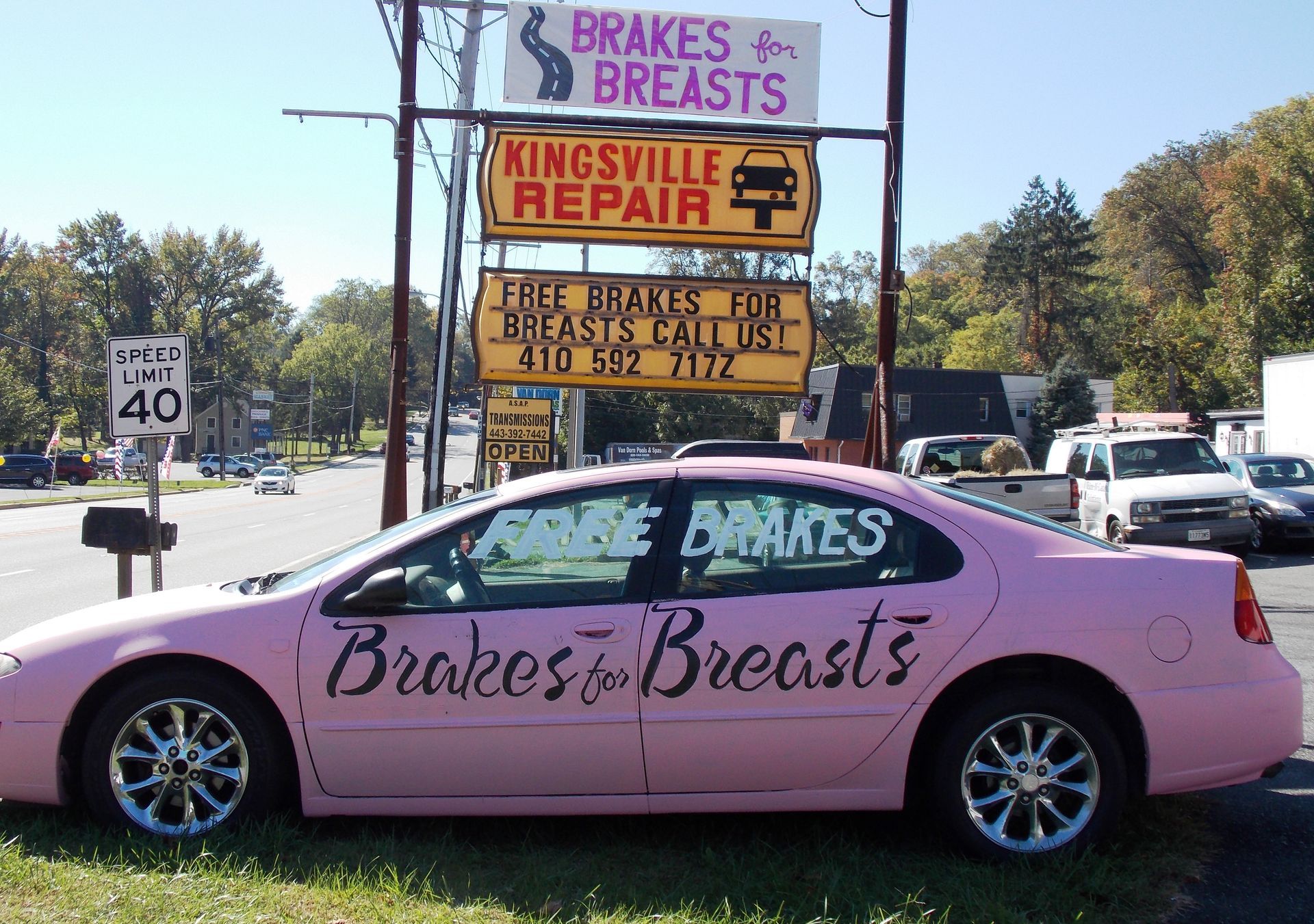 Kingsville Auto Repair, MD pink car parked with Free Brakes text | Brakes For Breasts