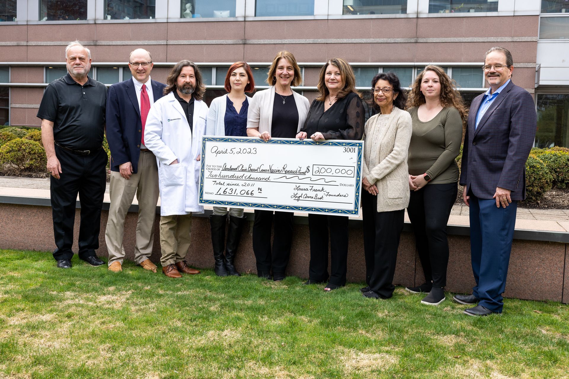 Presenting a large check to Cleveland Clinic at the 2022 Check Presentation | Brakes For Breasts