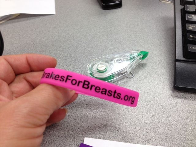 Jessica Hernandez on TV discussing Brakes For Breasts with pink bracelet | Brakes For Breasts
