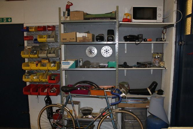 bicycle frame and shelves of tools