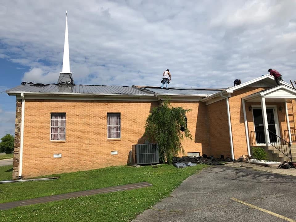 Roof Repair With Workers Above