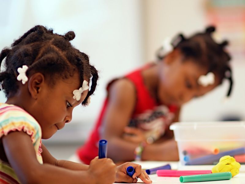 Kid Coloring The Book — York, PA — Sunshine Christian Daycare / Learning Center