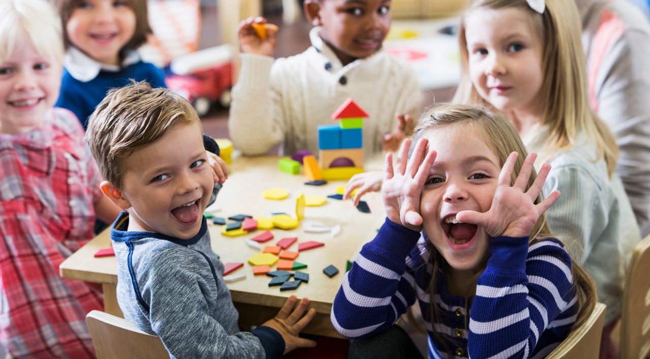 Kids Playing In The Table — York, PA — Sunshine Christian Daycare / Learning Center