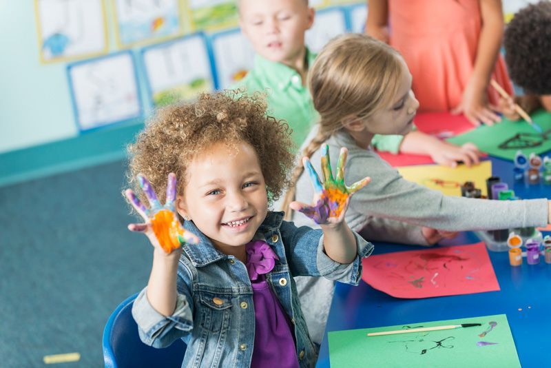 Boy In Hand Paint — York, PA — Sunshine Christian Daycare / Learning Center Boy In Hand Paint — York, PA — Sunshine Christian Daycare / Learning Center