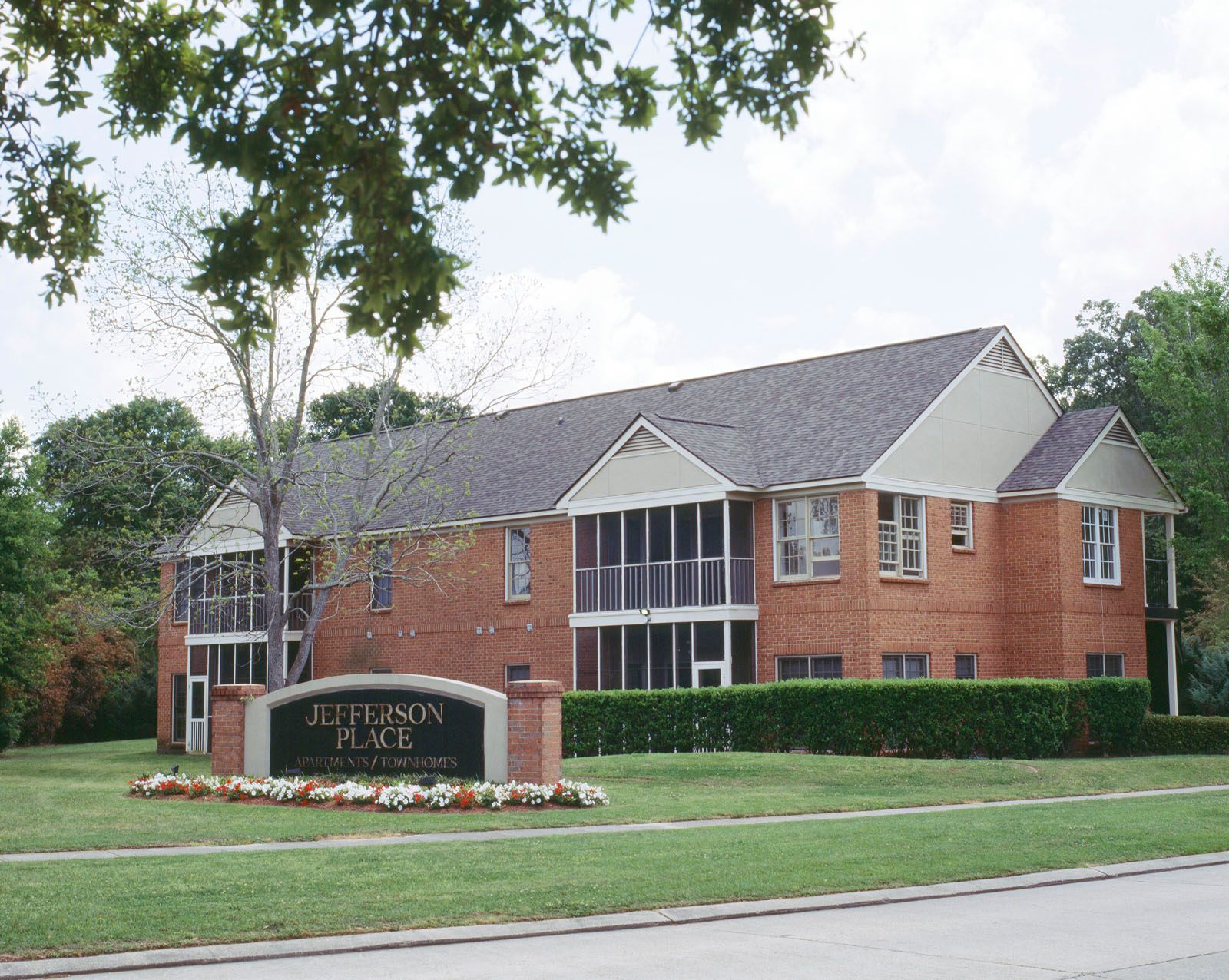 Brick building with a sign that reads