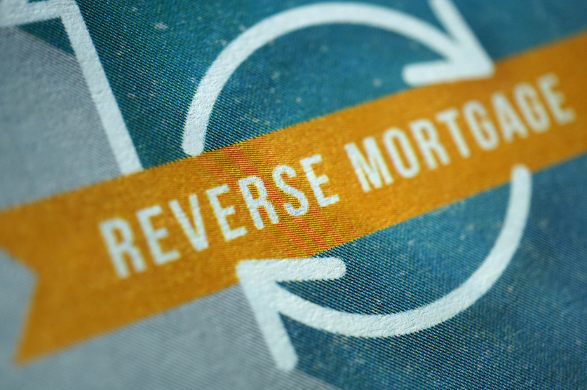 A close up of a sign that says reverse mortgage