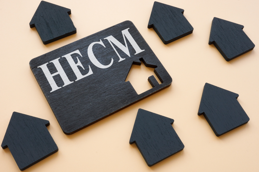 A piece of wood with the word hecm on it