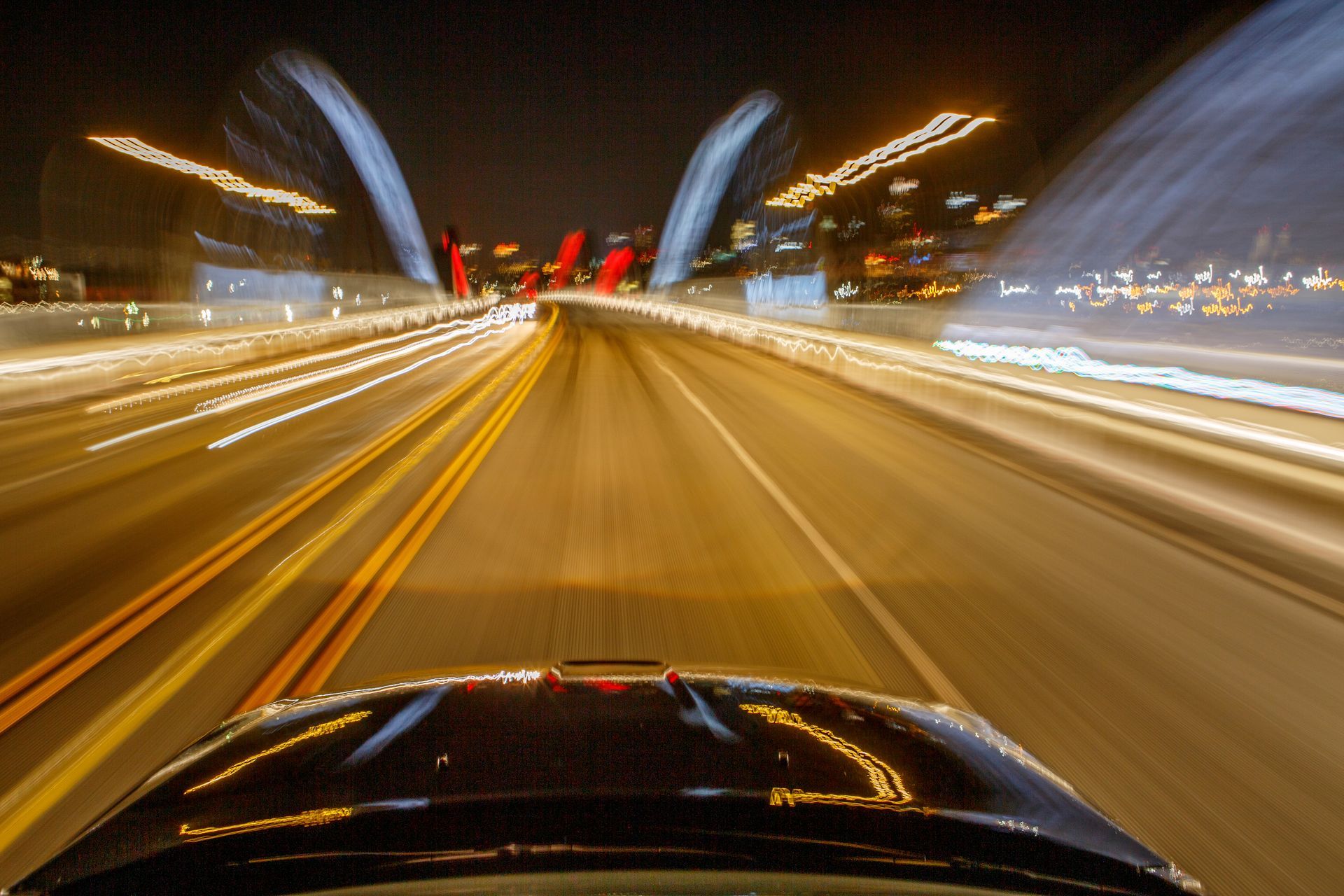 A fast driving car. A fast driving car.