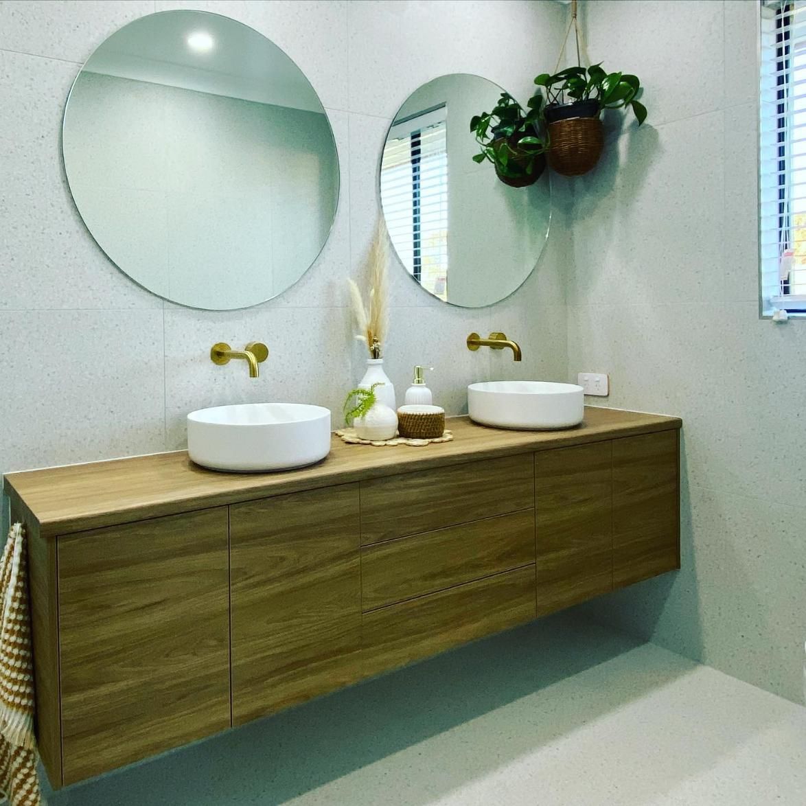 A Bathroom With Two Sinks and Two Round Mirrors — Reflect Glass In Lake Macquarie, NSW