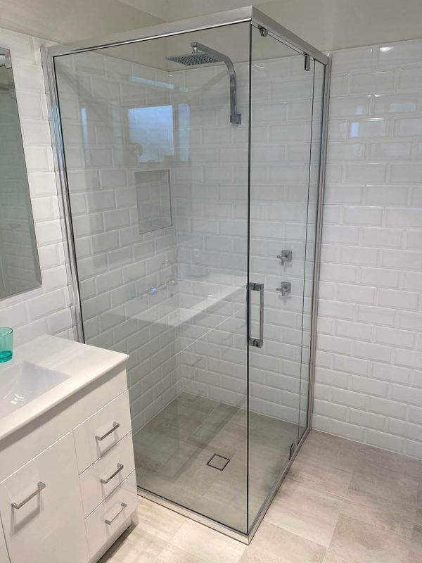 A Bathroom with A Walk in Shower and A Sink — Reflect Glass In Tuggerah, NSW