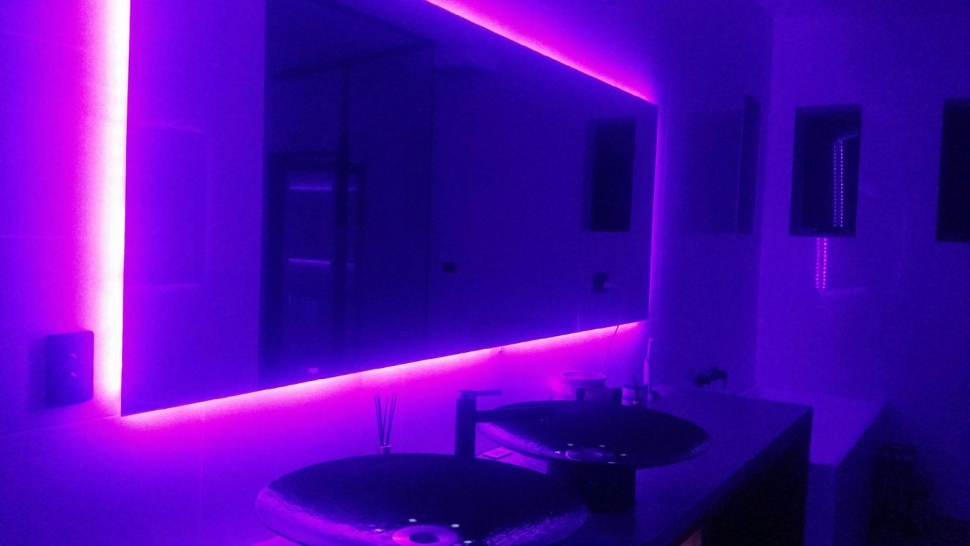 A Bathroom With Two Sinks and a Mirror With Purple Lights on the Wall — Reflect Glass In Woy Woy, NSW