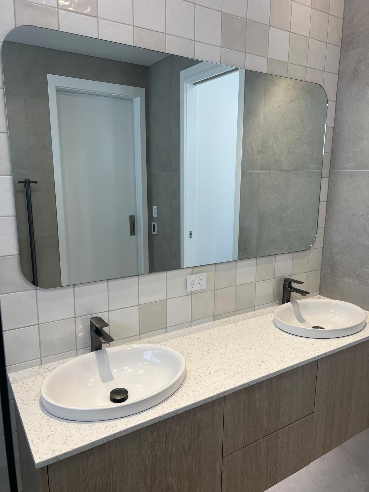 A Bathroom With Two Sinks and Two Mirrors — Reflect Glass In Tuggerah, NSW