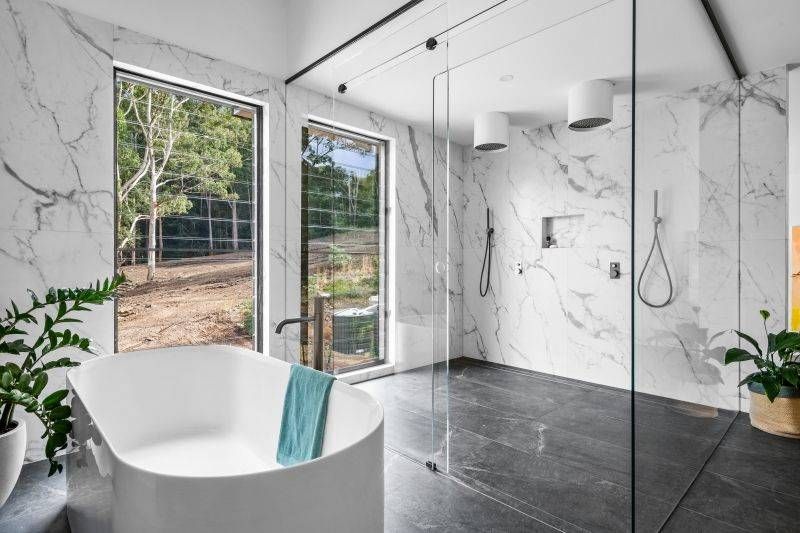 A Bathroom With a Walk in Shower and a Sink — Reflect Glass In Tuggerah, NSW