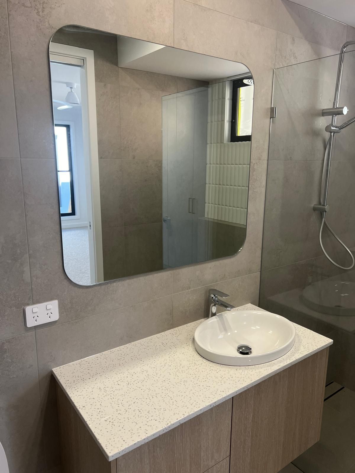 A Bathroom With a Toilet, Sink, Mirror and Shower — Reflect Glass In Tuggerah, NSW