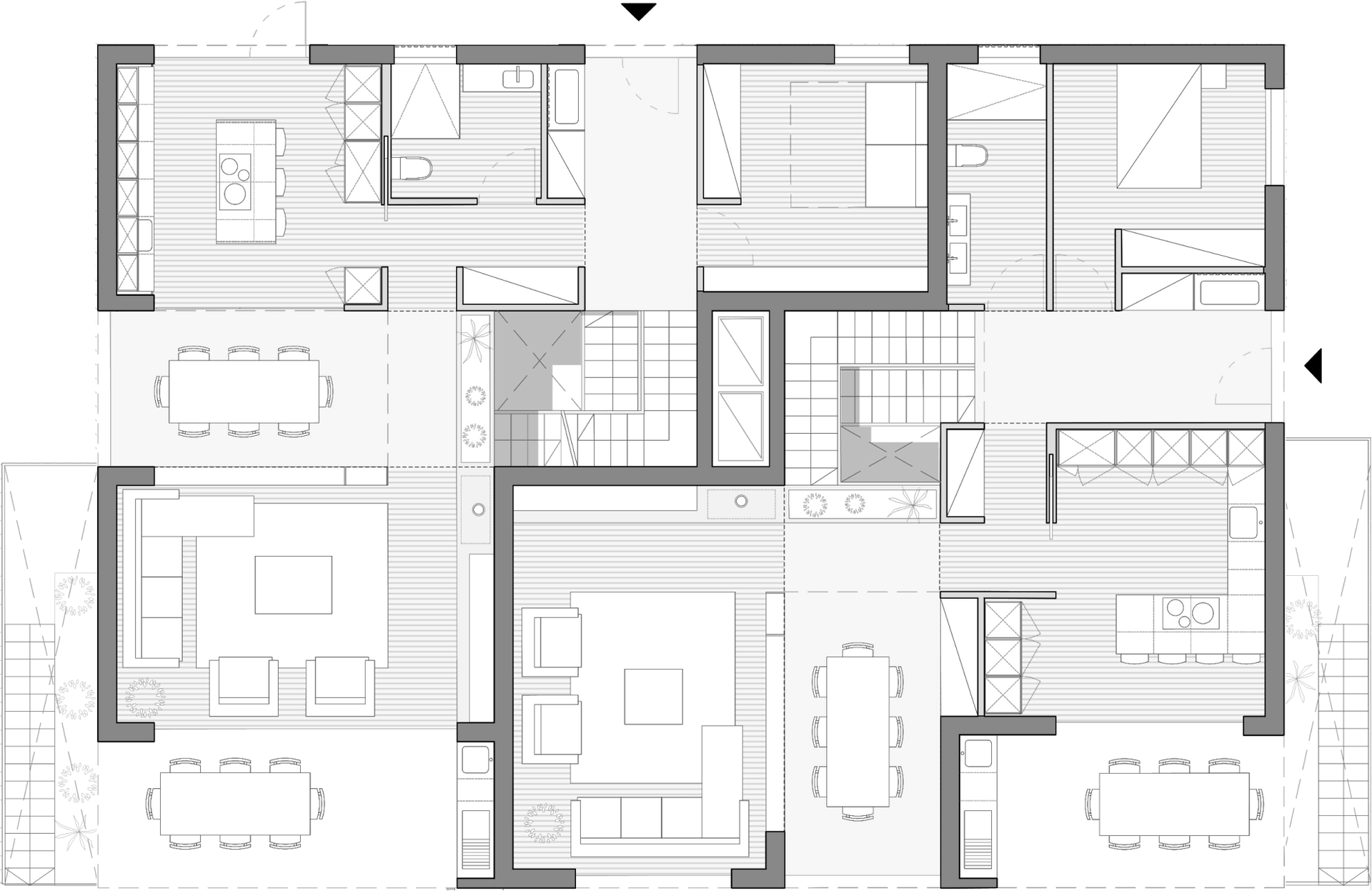 A black and white floor plan of a house with a lot of furniture.