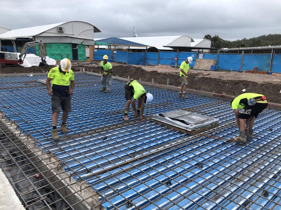 Construction Workers Building a Slab — AJ's Concreting Services in Taylors Beach, NSW