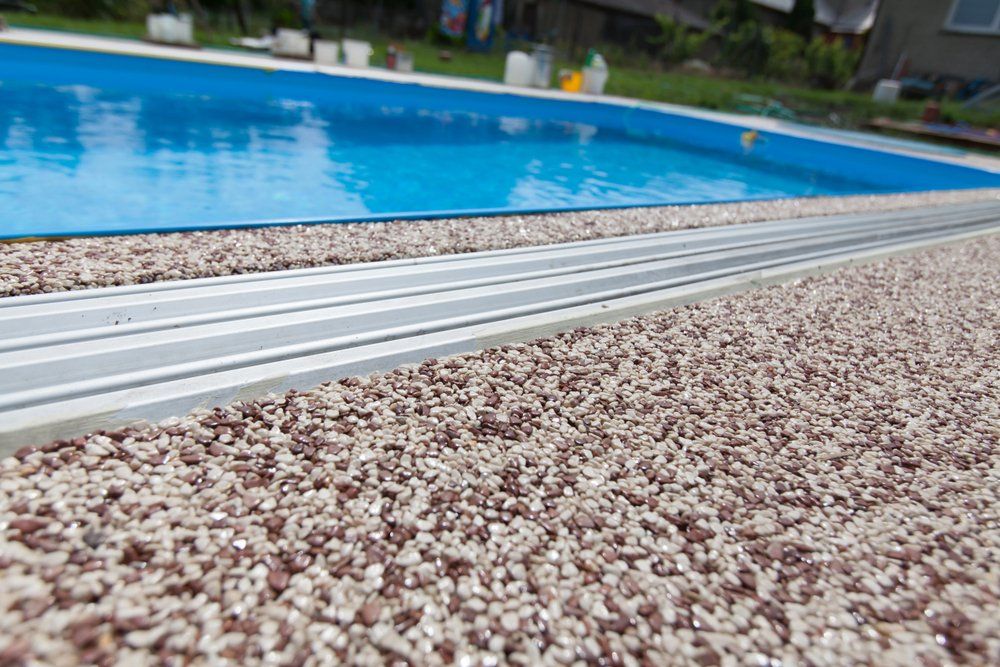 Pool with Exposed Aggregate Surroundings — AJ's Concreting Services in Taylors Beach, NSW