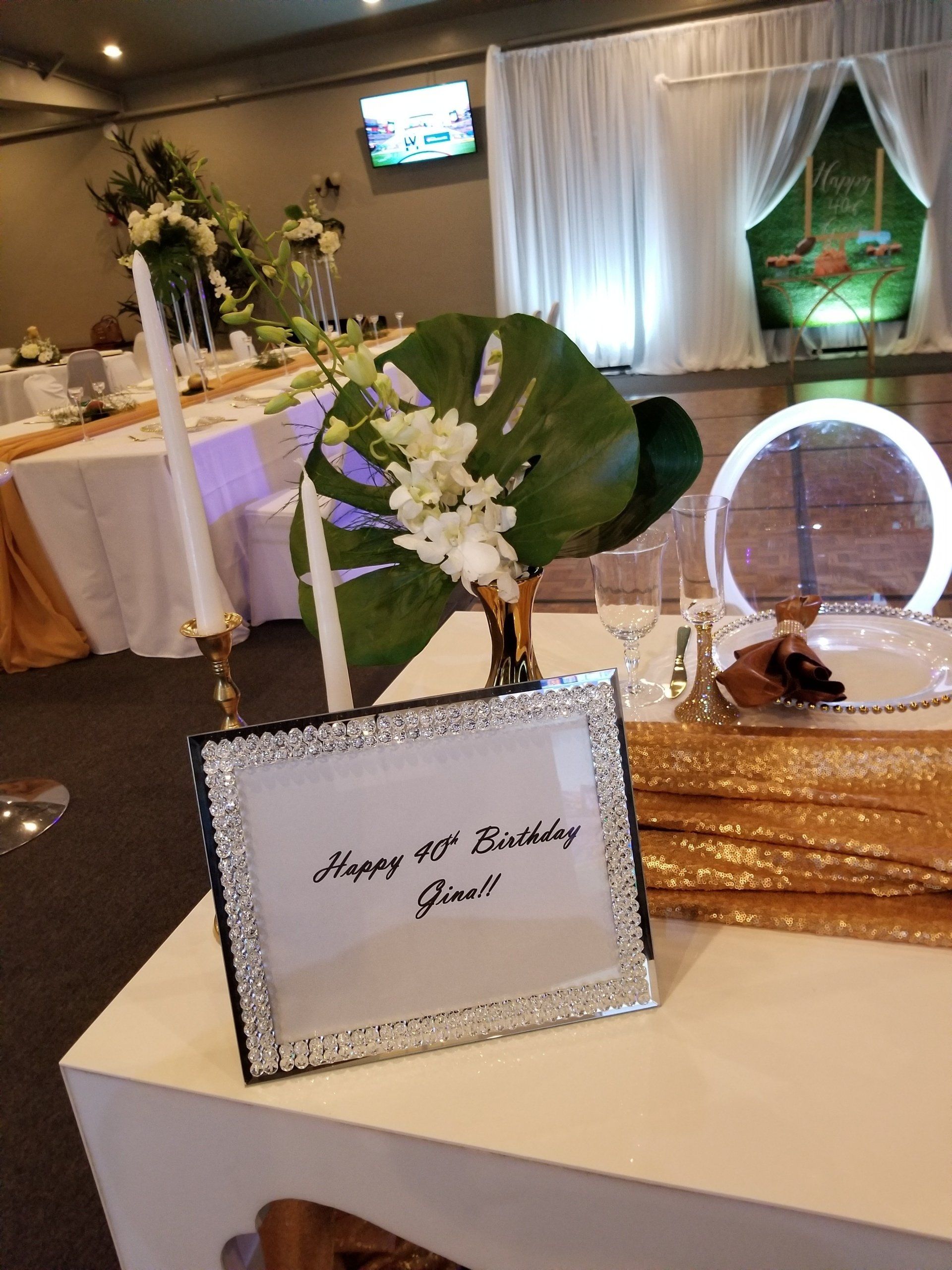 Birthday party table with sign reading