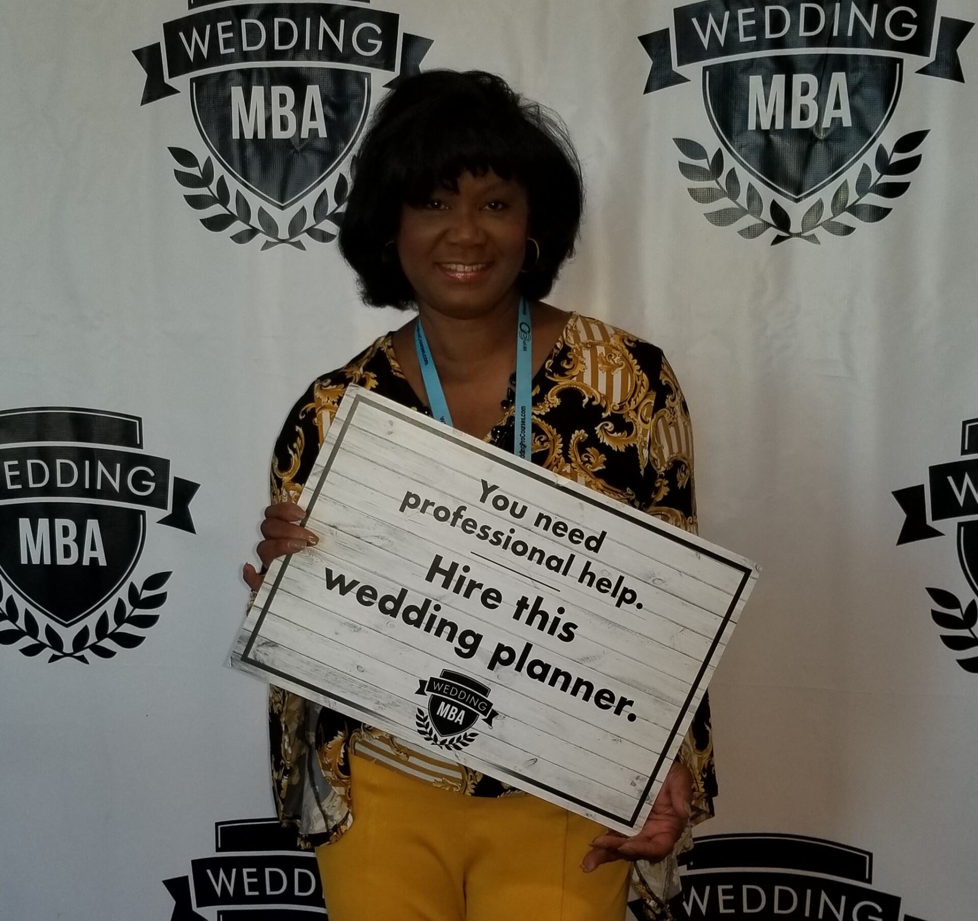 A woman holding a sign that reads 