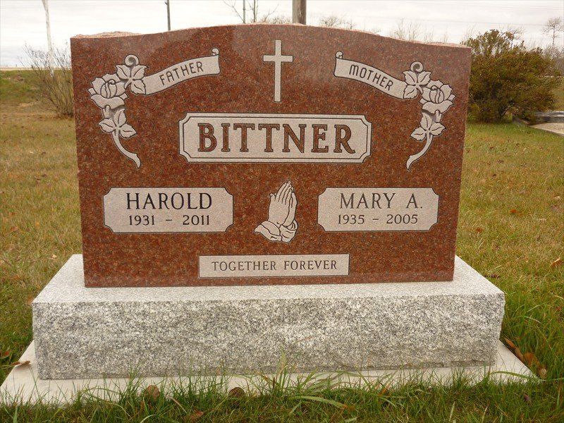 A gravestone for harold bittner and mary a.