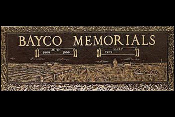 A grave marker for two people named bayco memorials