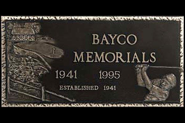 A bronze plaque for bayco memorials established in 1941