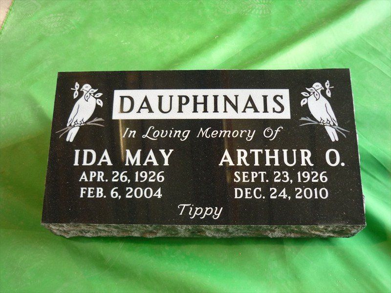 A gravestone for dauphinais ida may and arthur o tippy
