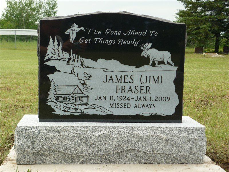 A gravestone for james jim fraser with a moose on it