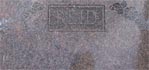A close up of a piece of metal with a square on it.