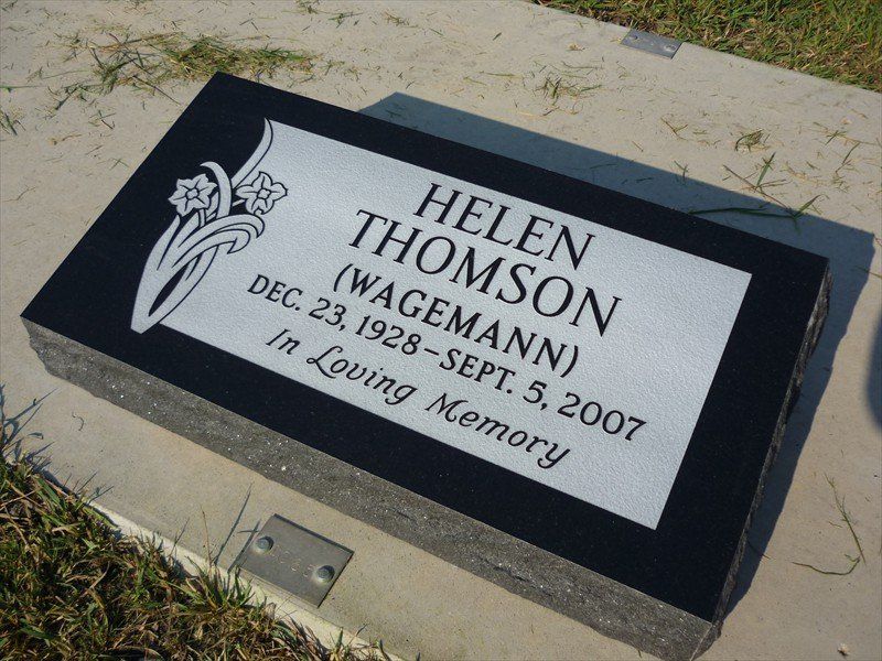 A gravestone for helen thomson who died in 2007