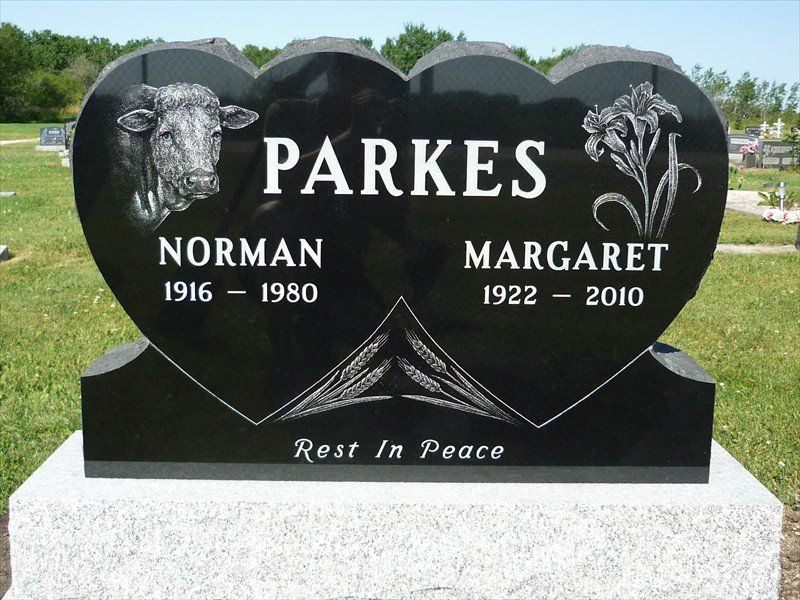 A black heart shaped grave marker for parkes and margaret