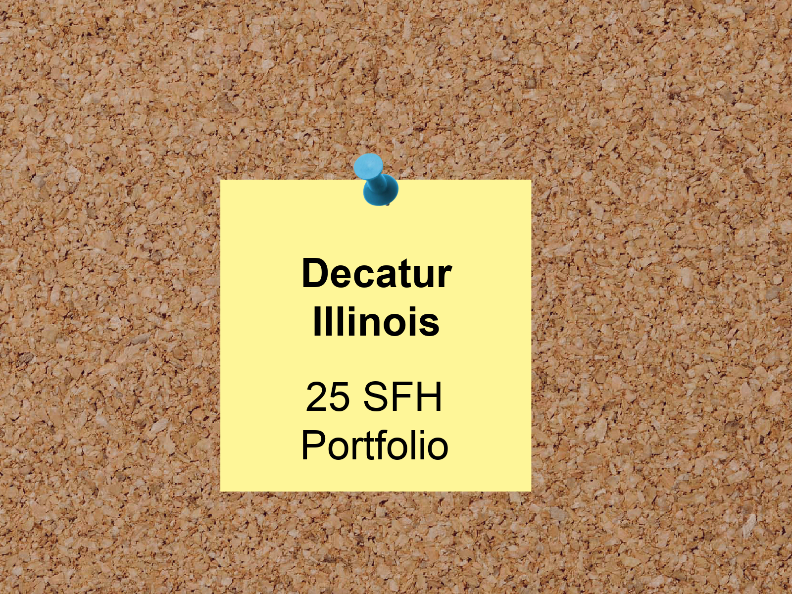 A post it note pinned to a cork board says decatur illinois 25 sfh portfolio